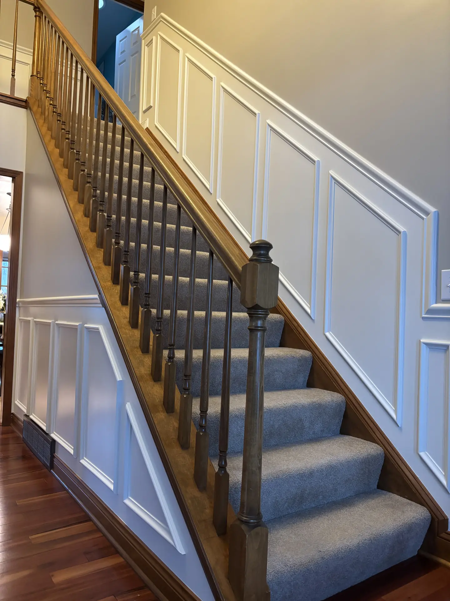 Staircase from below with wainscoting